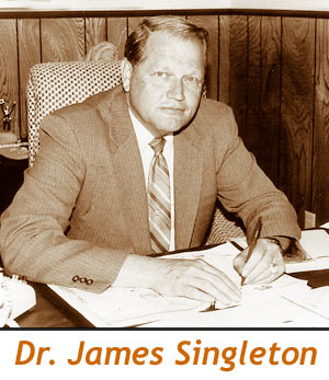 Singleton at desk