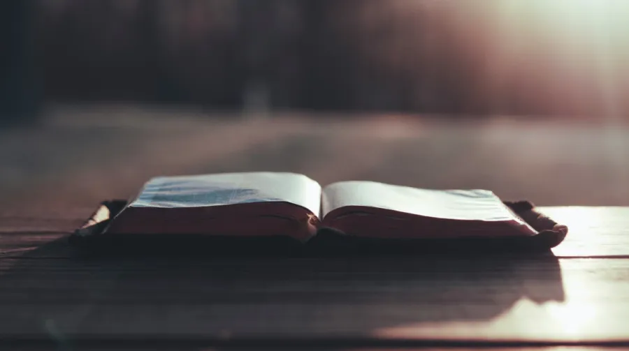 Bible at Sunrise on a Table