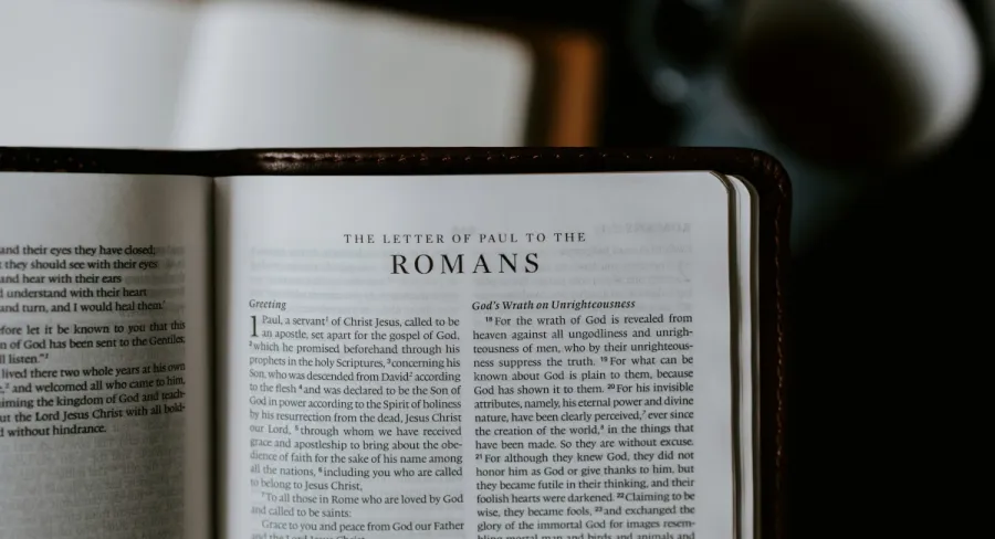 Image of a Bible open to Romans