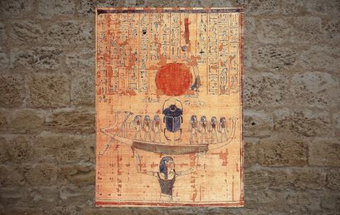 Nun, god of the waters of chaos, lifts the barque of the sun god Ra