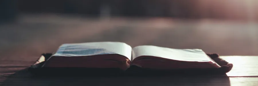 Bible at Sunrise on a Table
