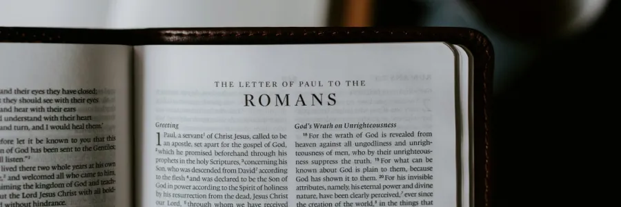 Image of a Bible open to Romans