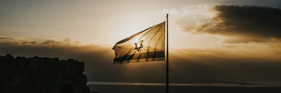 Photo of Israeli flag at sunrise